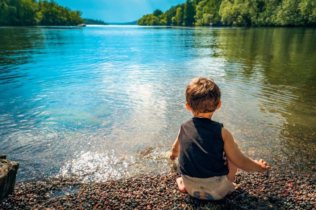Bare foot on pebbles 